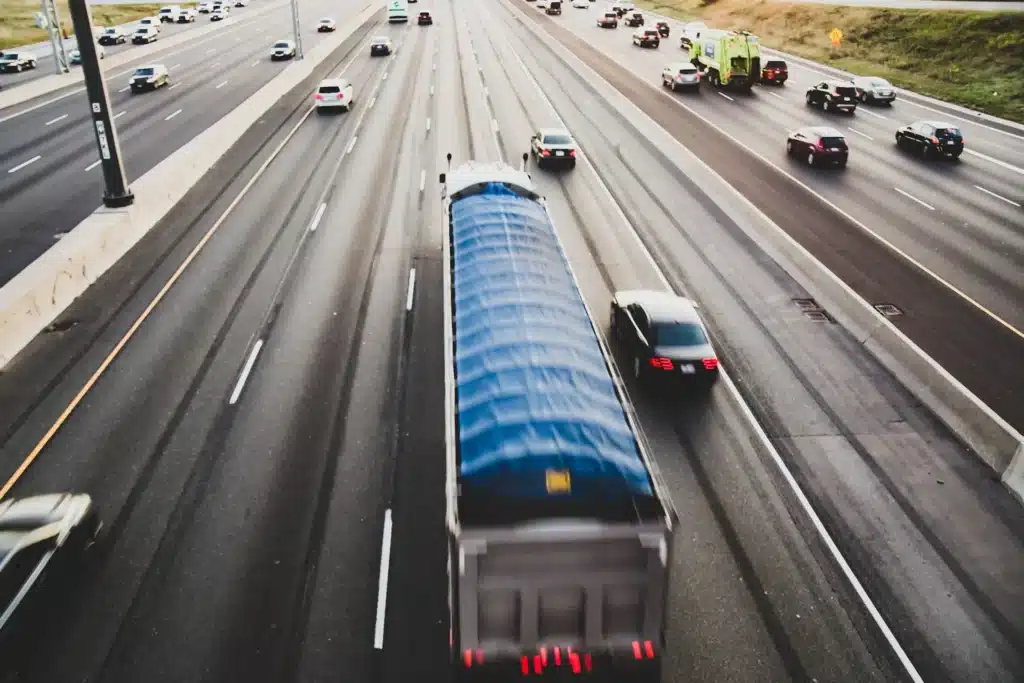 transport trucks on highway and traffic