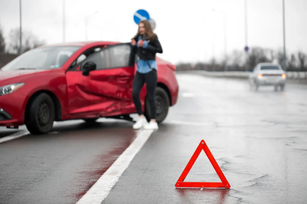 Driver after car accident on road