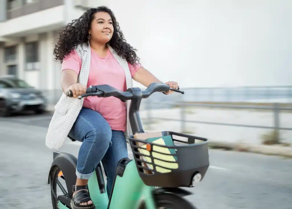 Hispanic woman riding her E bike