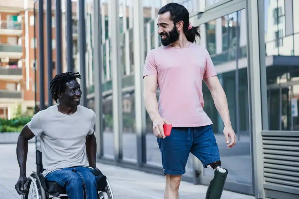 Friends with disabilities walking down the sidewalk